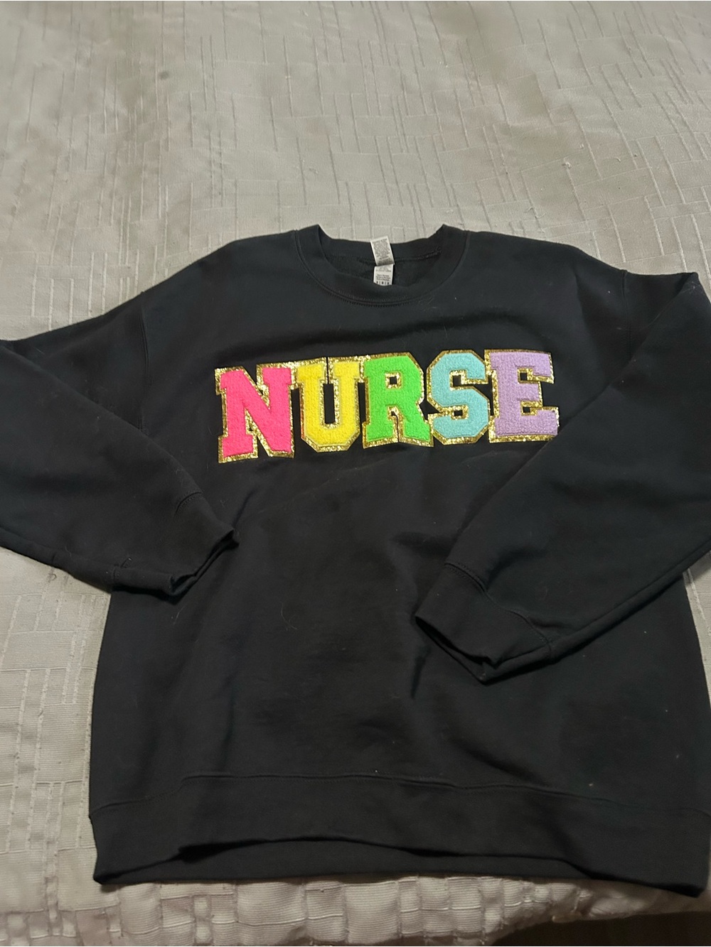 Black 'NURSE' Crewneck Sweater with Multicolor Lettering